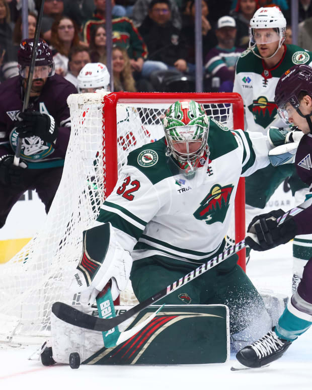 Minnesota Wild goaltender Filip Gustavsson (32) makes a save against Anaheim Ducks right wing Troy Terry (19) during the second period of a game at Honda Center in Anaheim, Calif., on March 19, 2024.